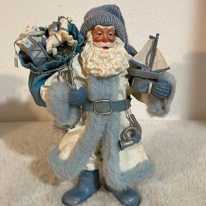 Vintage Clothique Santa Figure